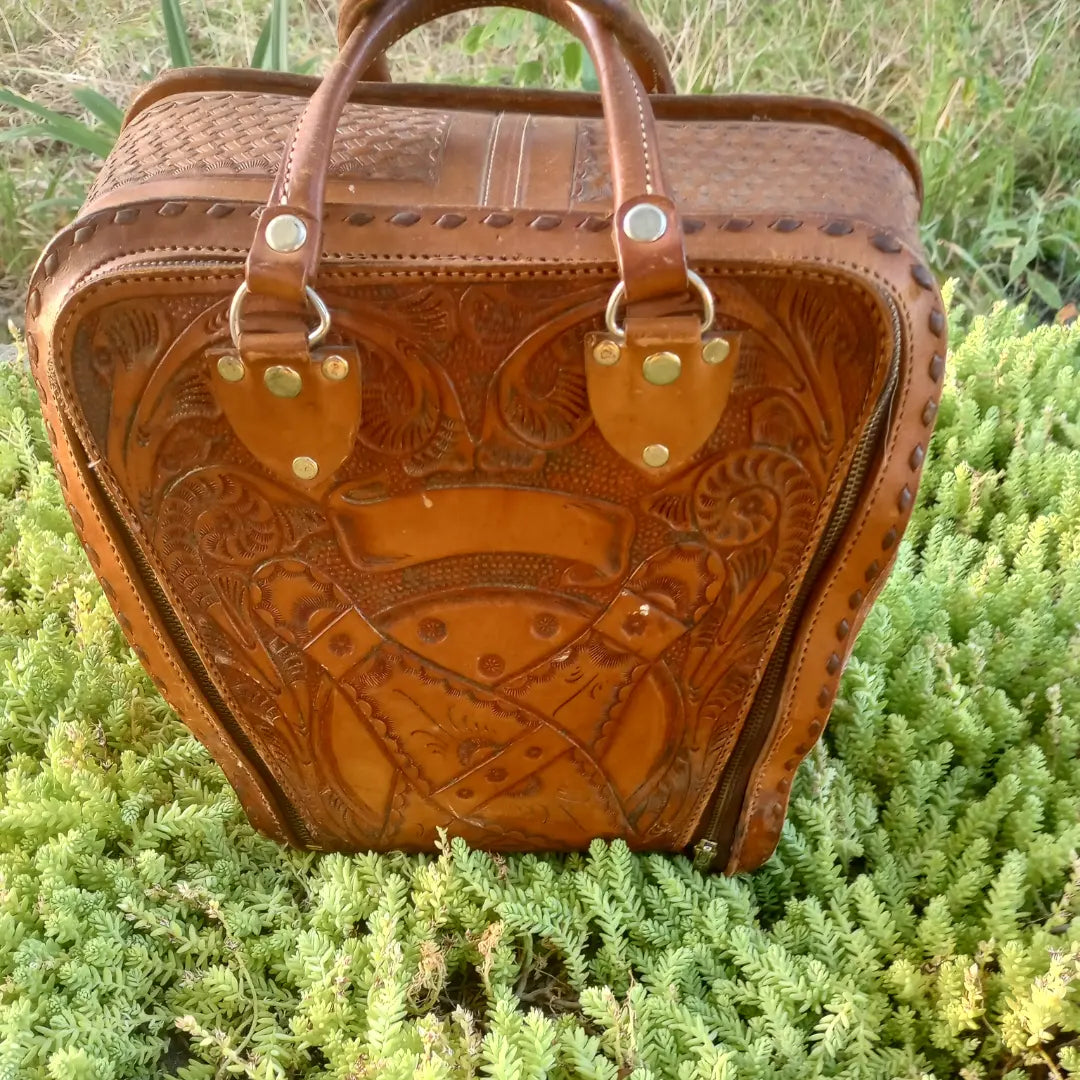 Gorgeous vintage tooled leather bowling bag turned Jewelry Carry on